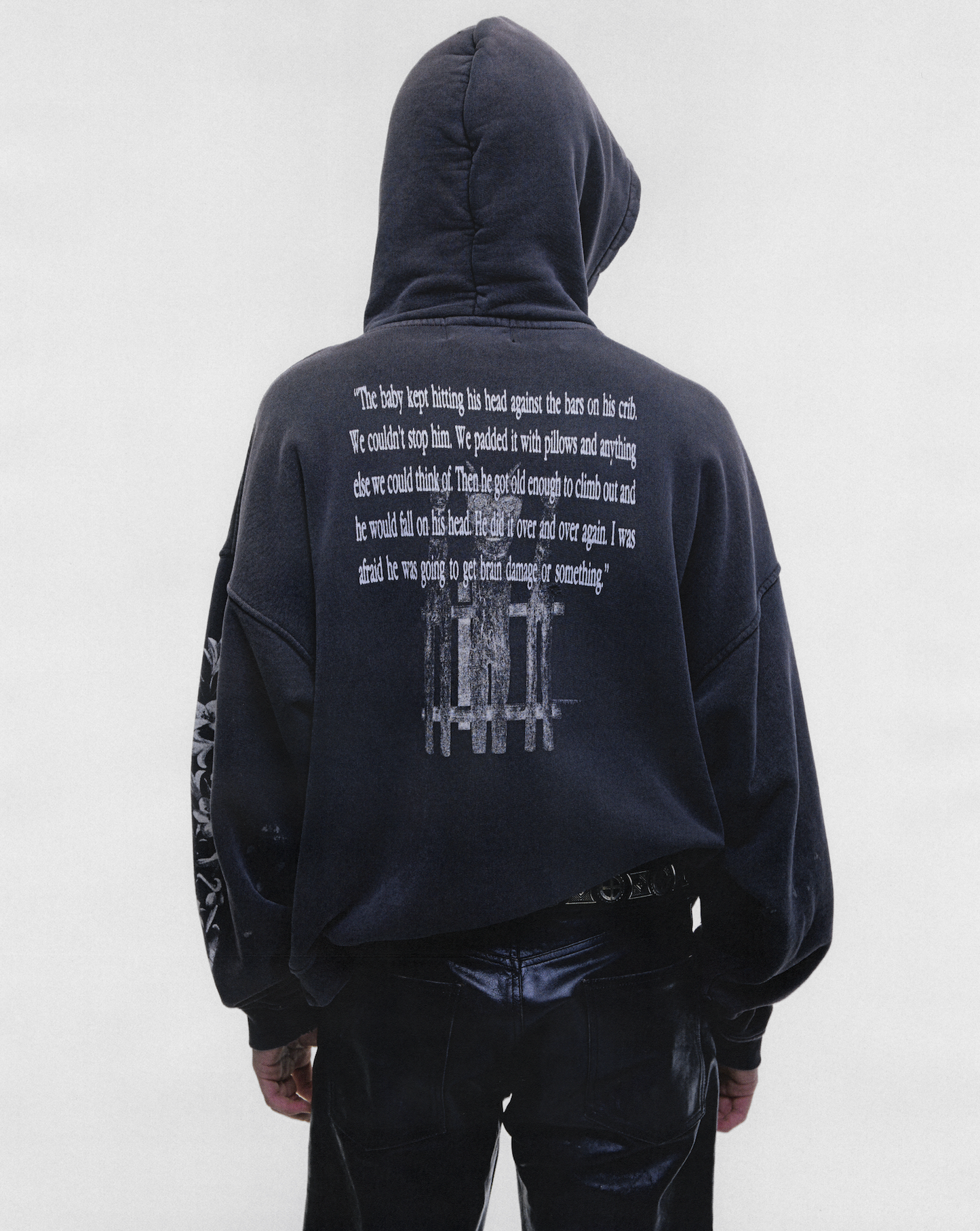 HEAD AGAINST THE BARS HOODIE
